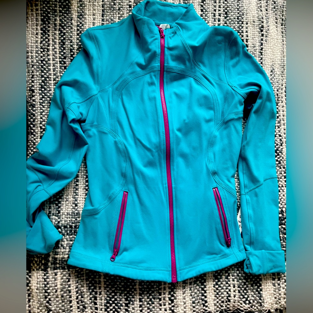 Lululemon woman jacket. Size 10 Color blue/ tiffany blue with pink zipper.